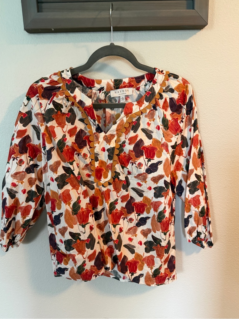 Hayden White Floral V-Neck Blouse with Orange & Red Accents